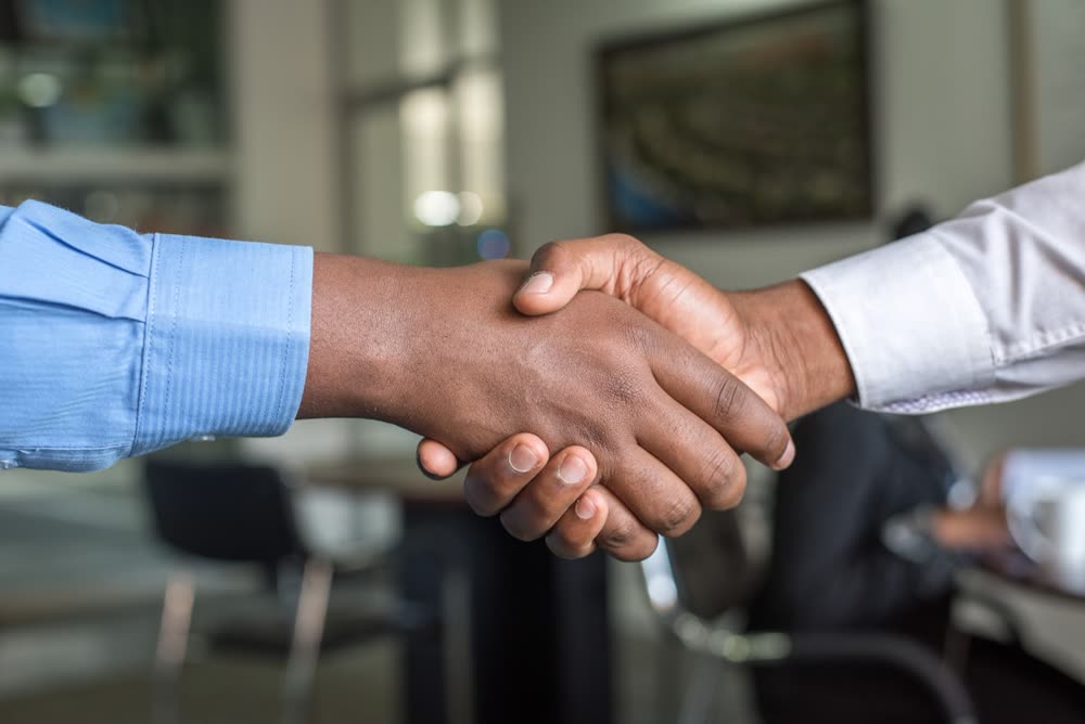 A handshake between capital partners